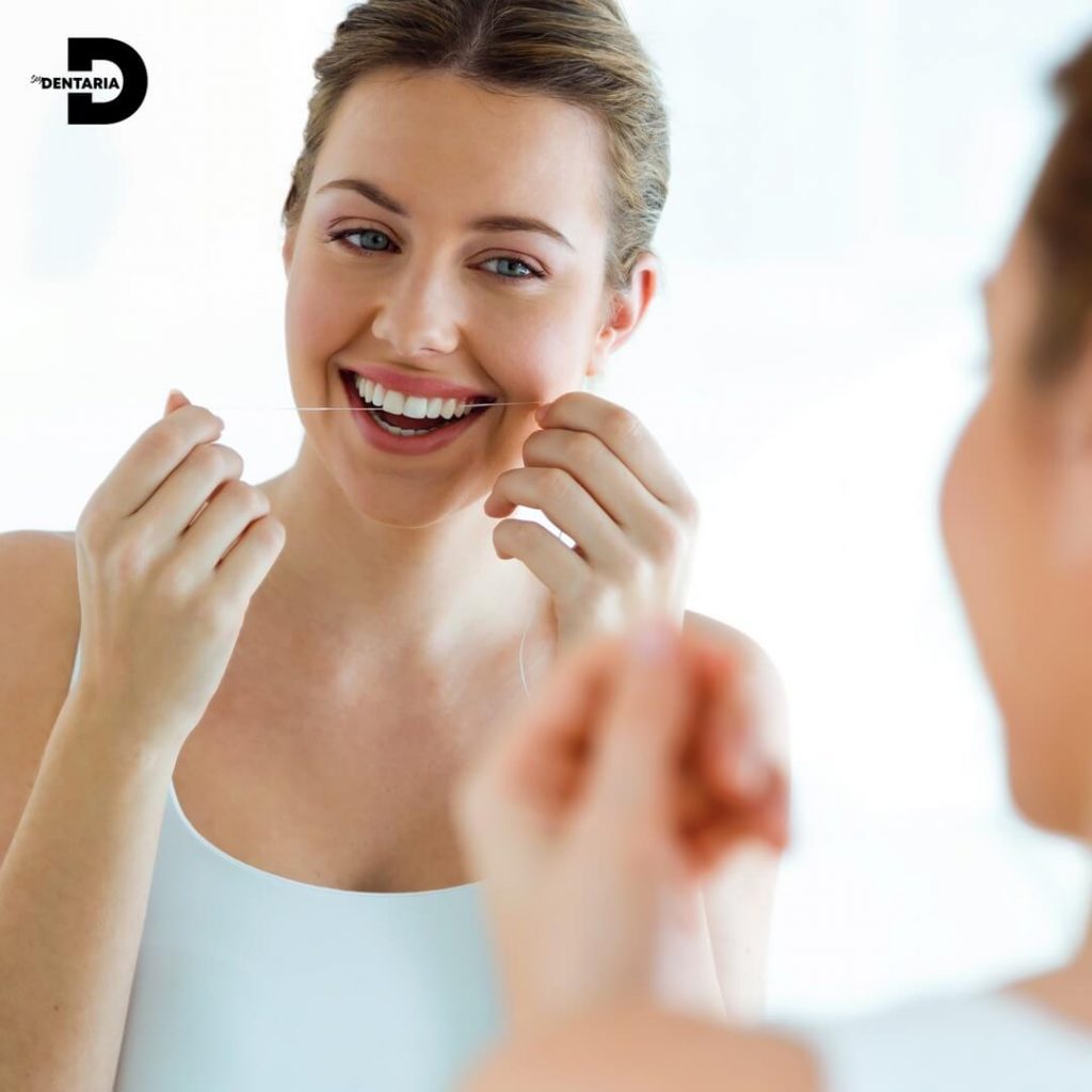 USO CORRECTO DEL HILO DENTAL